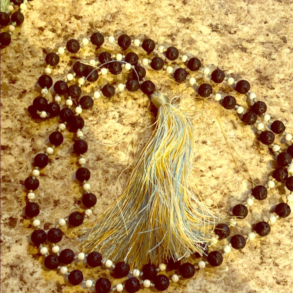 Zacasha volcanic rock and silk tassel necklaces